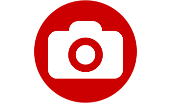 white camera inside red circle